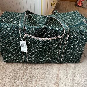 Vera Bradley large bag , cosmetic bag and 3 pouches.